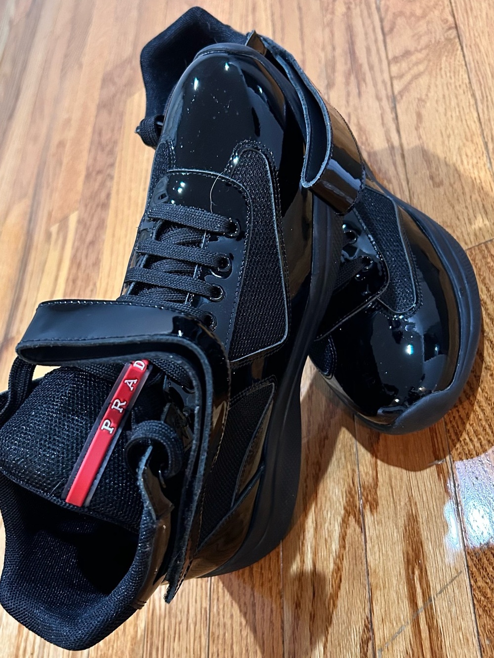Prada Black High-Top Sneaker with Red Logo Stripe - Picture 5 of 7